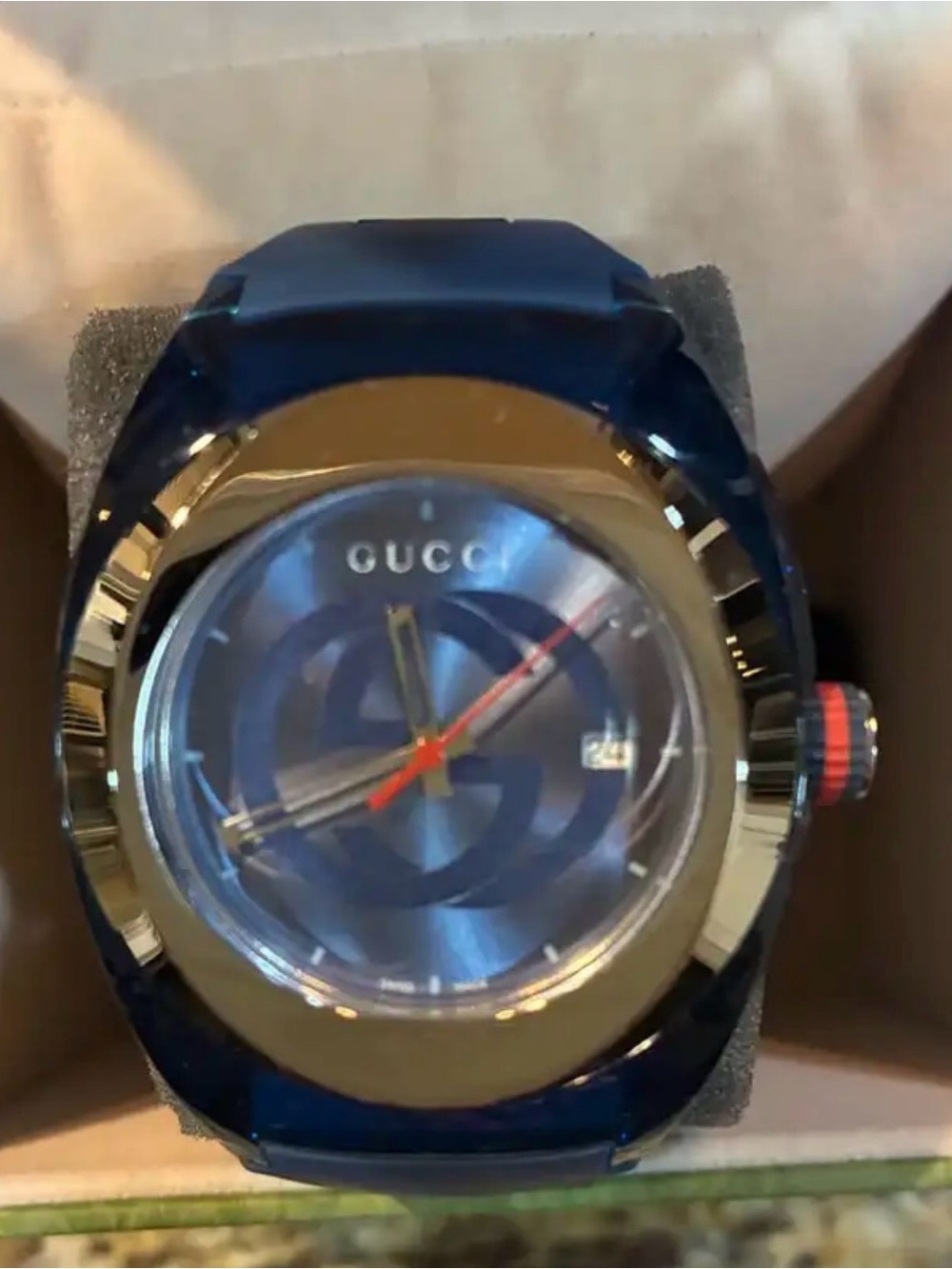 Gucci Men’s Blue Dial Watch with Gold Bezel and Red Accent